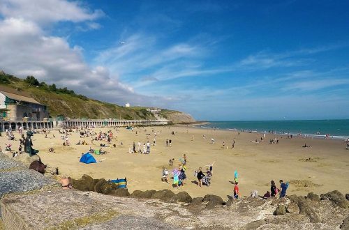united kingdom folkestone sunny day playing on the beach beach sea and sky travelandhome