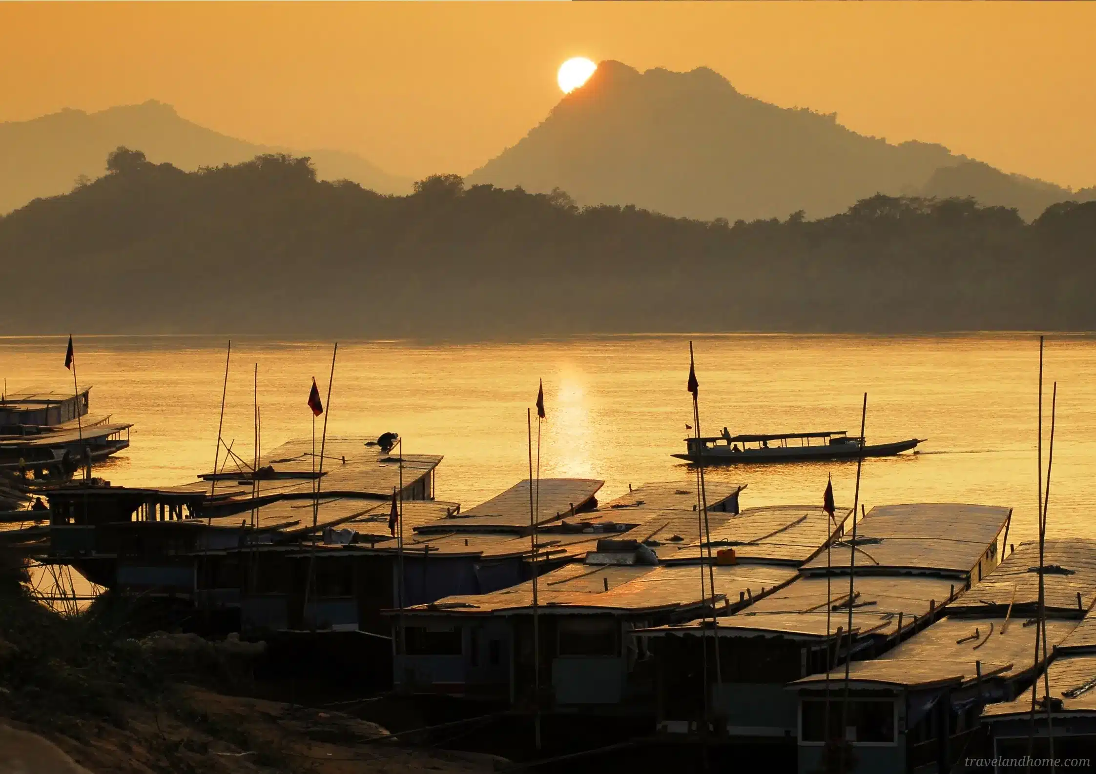 The sun melt into the Mekong, Luang Prabang, A Cultural And Spiritual Hidden GemThe Most Beautiful Ancient Town: Luang Prabang, Laos