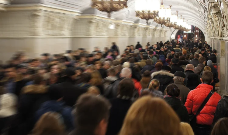 Travel warnings, red flags in crowded places, Crown on metro station in Moscow, Russia